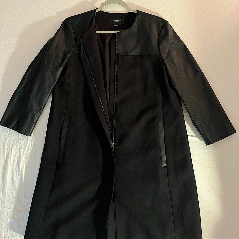 Worn once Ann Taylor long coat with leather accents on the arms and pockets!
